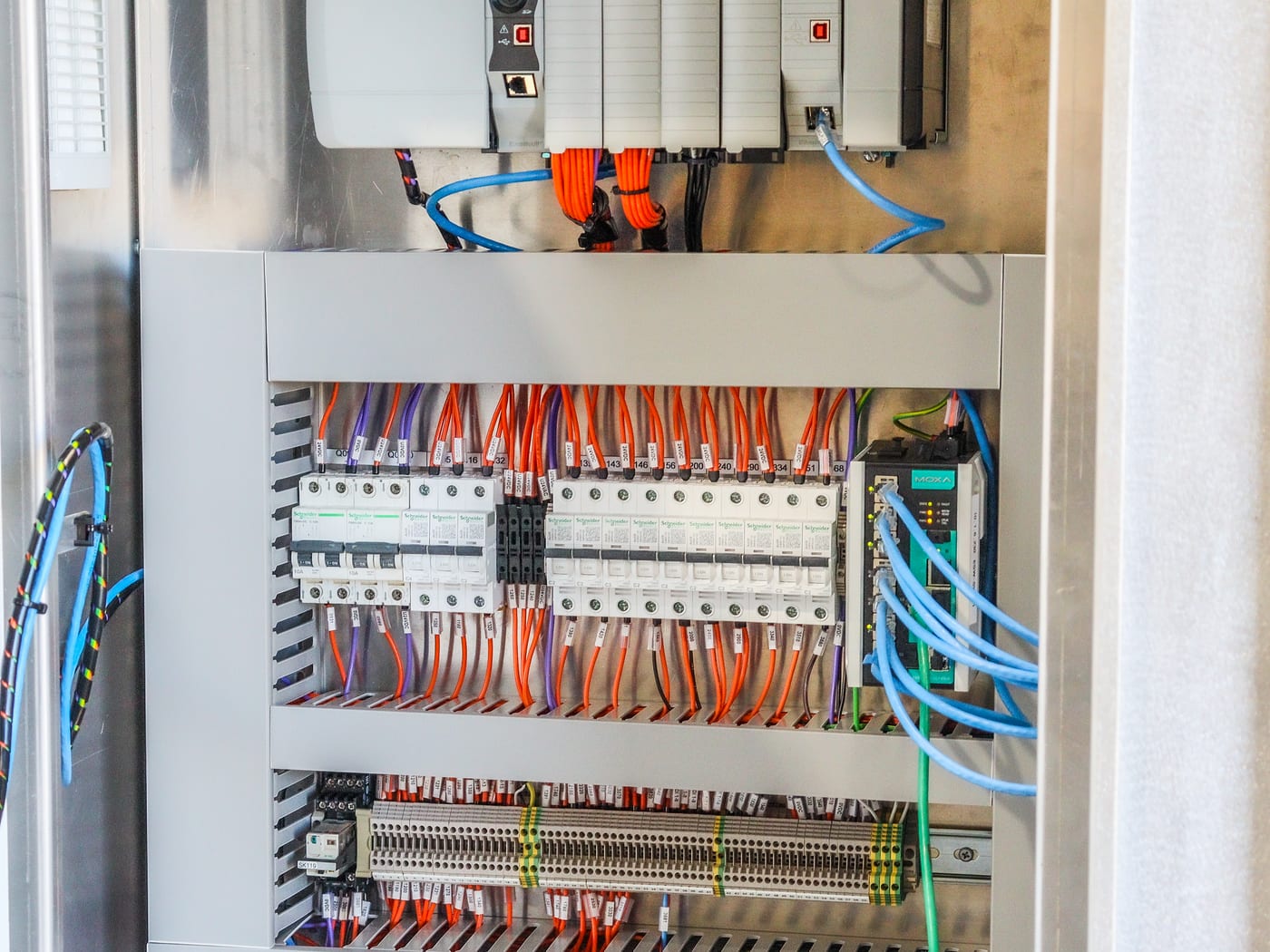 Finished custom switchboard with Schneider breakers, wiring looms and terminals